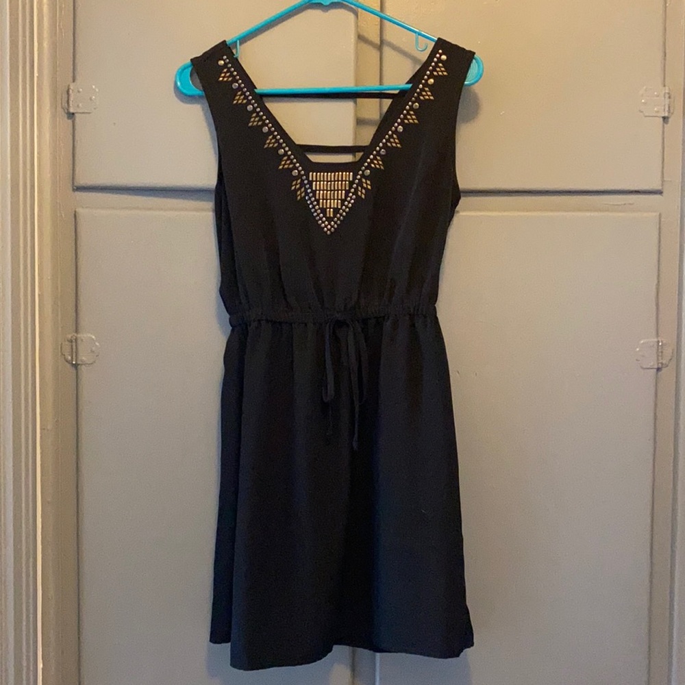 Black dress with metal design